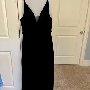 Size 12 never worn Pomuyoo dress. Laces up in back. Gorgeous.